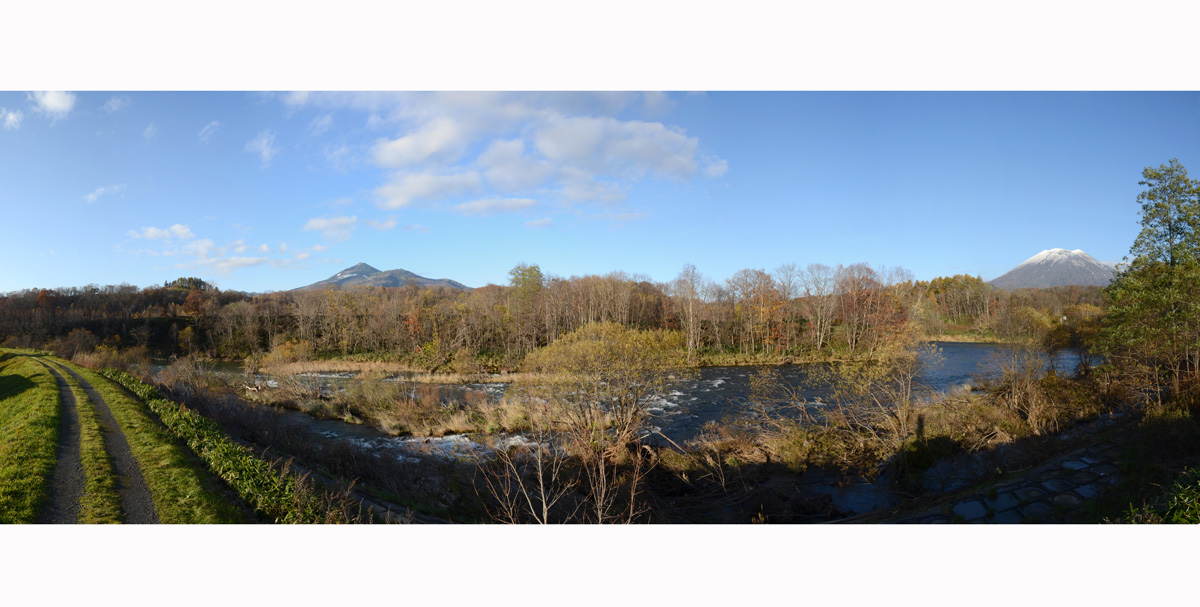 autumn snowfall on Youtei and Annupuri from the river down it Niseko