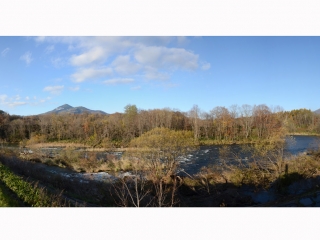 autumn snowfall on Youtei and Annupuri from the river down it Niseko