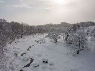 shiribetsu river mid winter in niseko