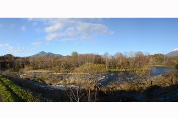 autumn snowfall on Youtei and Annupuri from the river down it Niseko