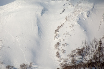 makkari side of Mt. yotei close up with skier tracks and hike tracks