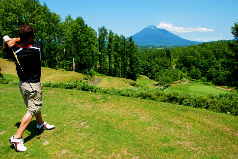 Ash tee off at the 16th Niseko Golf Course